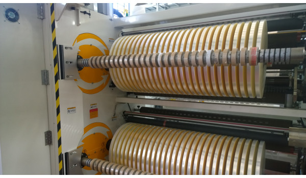 Turret slitter for hot stamping foil material